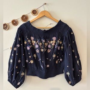 Free People navy cotton embroidered top. Worn but in excellent condition.